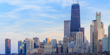 Why is Chicago considered as a “windy city”?